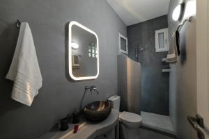 A bathroom at Amphoras Apartments