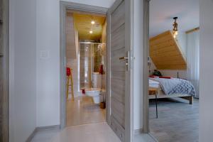 Posteľ alebo postele v izbe v ubytovaní Apartament Góralska Ostoja prywatne wejście widok na Tatry
