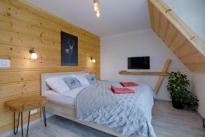 Posteľ alebo postele v izbe v ubytovaní Apartament Góralska Ostoja prywatne wejście widok na Tatry