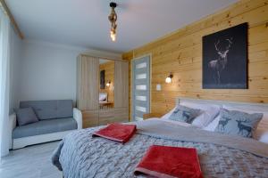 Posteľ alebo postele v izbe v ubytovaní Apartament Góralska Ostoja prywatne wejście widok na Tatry