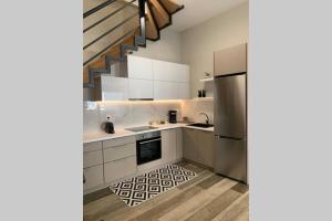 A kitchen or kitchenette at Aelia Luxury Beach House