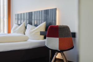 Rúm í herbergi á Motel Z - self checkin
