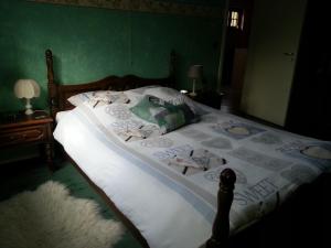 Postel nebo postele na pokoji v ubytování Chambre d'hotes du Tailfer