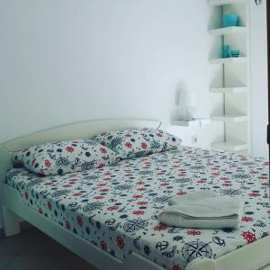 Postel nebo postele na pokoji v ubytování Apartmani Dačo