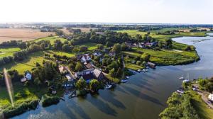 an aerial view of a small island in a river at Feriendomizil Wohltat in Wilhelmshof