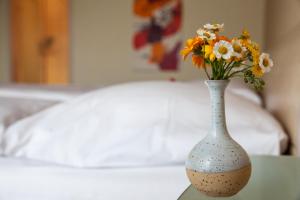 Letto o letti in una camera di Hotel Garni Brigitte
