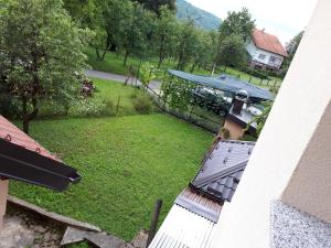 an aerial view of a yard with a roof at IRIS Room & Apartment in Slunj