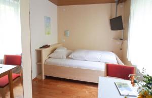 Letto o letti in una camera di Hotel Garni Brigitte