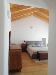 מיטה או מיטות בחדר ב-Casa Vecchia, ma Moderna