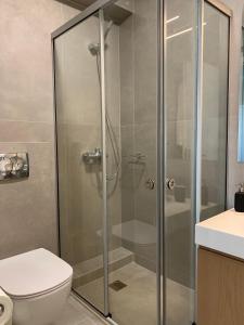 A bathroom at Aelia Luxury Beach House Még 37 kép