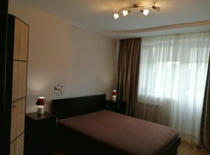 Кровать или кровати в номере Big Apartment in Rivne center