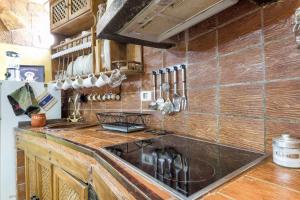 a kitchen with a sink and a counter top at Casa Carmela in La Guancha