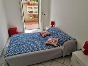 A bed or beds in a room at A CASA