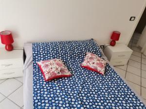 A bed or beds in a room at A CASA