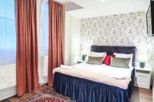 Postel nebo postele na pokoji v ubytování Hotel City Living + 37 fotografií
