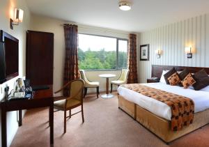 Voodi või voodid majutusasutuse Kiltimagh Park Hotel toas