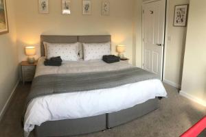Ένα ή περισσότερα κρεβάτια σε δωμάτιο στο Bar Lodge at Broxa