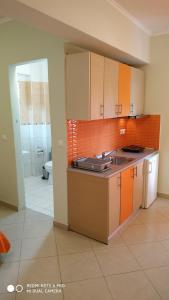 Kuchyňa alebo kuchynka v ubytovaní Oniro Rooms & Suites