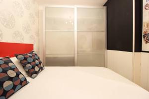 Llit o llits en una habitació de Céntrico Apartamento Estilo Pop-Art by Batuecas