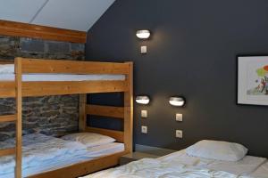 Vuode tai vuoteita majoituspaikassa Rustig gelegen gîte nabij Houffalize