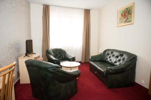 Posedenie v ubytovaní Hozam Wellness és Apartman