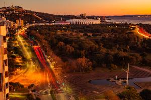 an aerial view of a city at sunset at Blue Tree Towers Millenium Porto Alegre in Porto Alegre