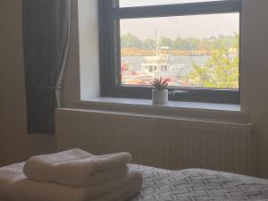 Katil atau katil-katil dalam bilik di Swan View, Oulton Broad