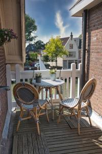Ein Balkon oder eine Terrasse in der Unterkunft Com-In