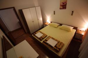an overhead view of a bedroom with a bed at Apartment ZO-NA in Povile