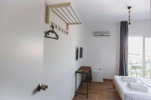 Postel nebo postele na pokoji v ubytování Belsun Hotel
