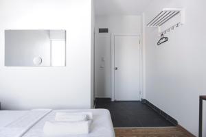 Postel nebo postele na pokoji v ubytování Belsun Hotel