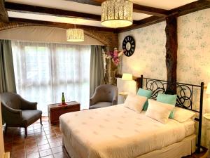 Cama o camas de una habitación en Akla La Casa Del Puente