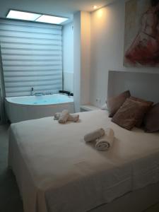 Postel nebo postele na pokoji v ubytování Blue Horizon Luxury Apartment