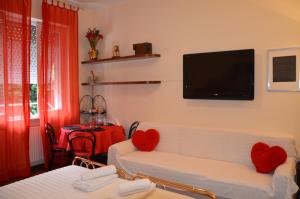 Postel nebo postele na pokoji v ubytování B&B Villa Olmo