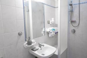 Koupelna v ubytování The Condottieri + 21 fotografií