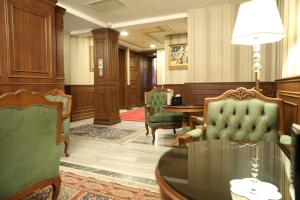 a court room with a table and chairs at Meserret Palace Hotel - Special Category in Istanbul
