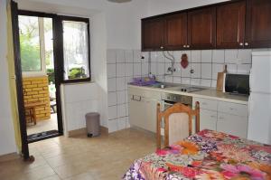 Kuchyň nebo kuchyňský kout v ubytování Apartments Matesic