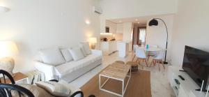 Μια τηλεόραση ή/και κέντρο ψυχαγωγίας στο Quinta do Lago Beach House