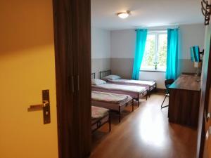 Fotografia z galérie ubytovania Pokoje Gościnne z Prywatną Łazienką dla firm v destinácii Gliwice