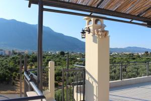 a balcony with a view of a mountain at New independent loft, 360⁰ view, 5' beach/center in Kalamata