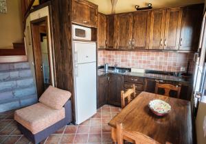 Kuchyň nebo kuchyňský kout v ubytování HOUSES RENTAL The BEST VIEWS