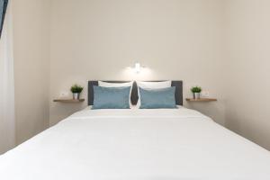 מיטה או מיטות בחדר ב-Apartman Mares