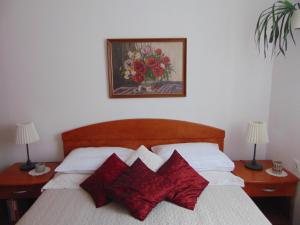 Postel nebo postele na pokoji v ubytování Apartments Petra