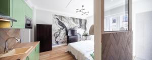 Posteľ alebo postele v izbe v ubytovaní ZACHÁR Apartman