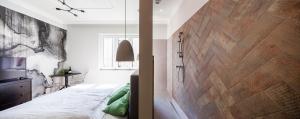 Posteľ alebo postele v izbe v ubytovaní ZACHÁR Apartman