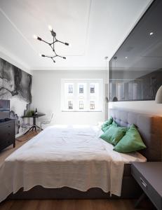 Posteľ alebo postele v izbe v ubytovaní ZACHÁR Apartman
