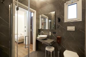 Łazienka w obiekcie Orizzonte MHotel