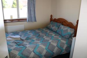 Ένα ή περισσότερα κρεβάτια σε δωμάτιο στο Lennard House