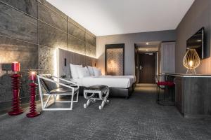 Televízia a/alebo spoločenská miestnosť v ubytovaní Nosalowy Park Hotel & Spa