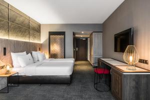 Posteľ alebo postele v izbe v ubytovaní Nosalowy Park Hotel & Spa